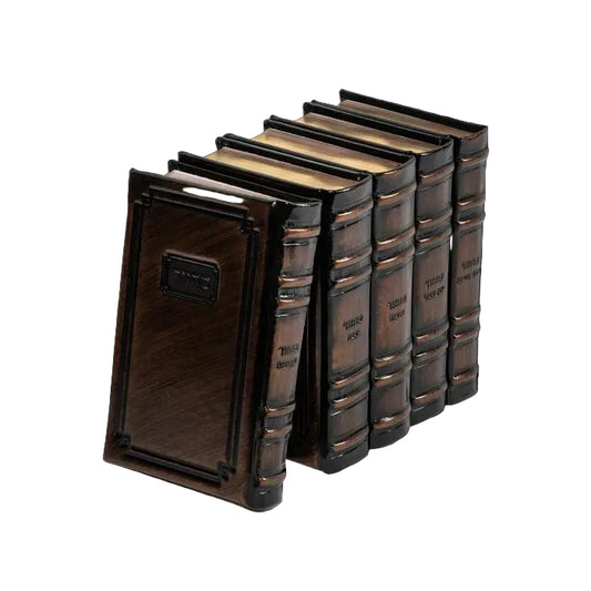 A set of five miniature decorative books with dark brown faux-leather spines and gold-embossed lettering, arranged in a row against a solid black background.